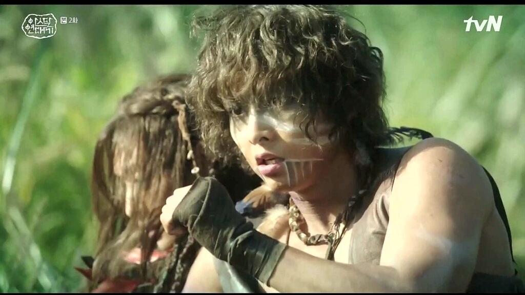 A tribal character from Arthdal Chronicles in war dress and makeup