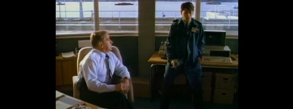 Hanson and his Captain in the office smoking