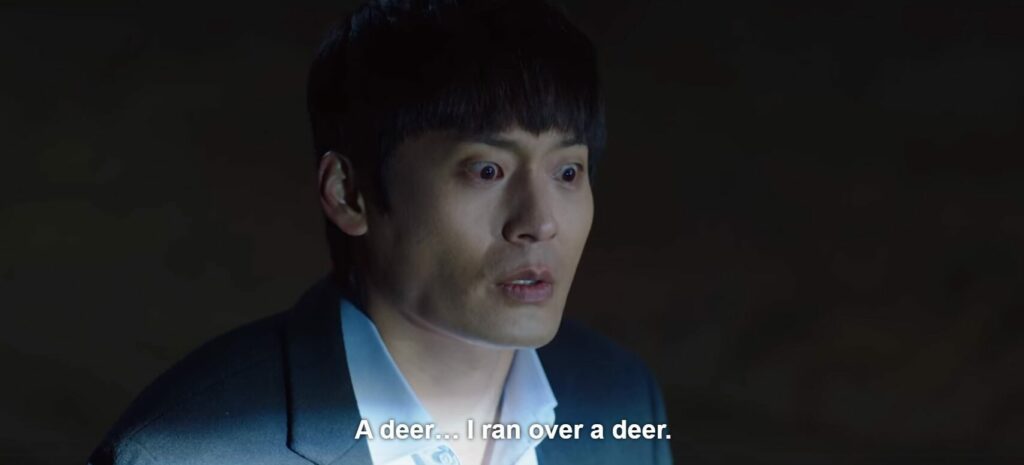 Jung-jae looking manic and terrified saying, "A deer... I ran over a deer."