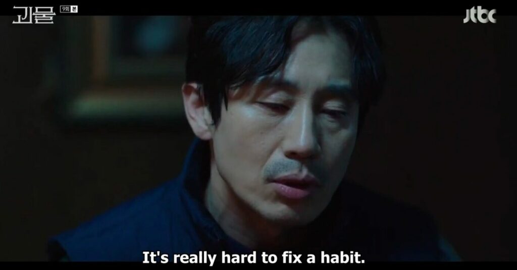 Dong-shik with his face barely illuminated as he sits in the dark, "It's really hard to fix a habit"