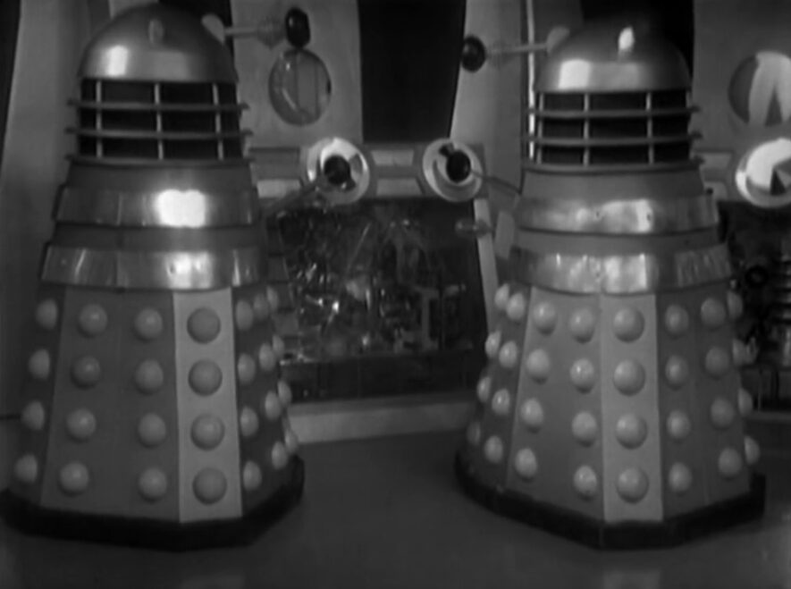 The Daleks, pepperpots with plungers and eye stalks, use their plungers to work the machinery in their city