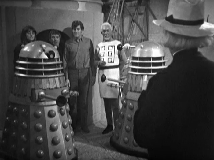 The Doctor in a tense standoff with the Daleks and Mavic Chen for the return of his companions, Sara, Steven and his frenemy, The Meddling Monk.