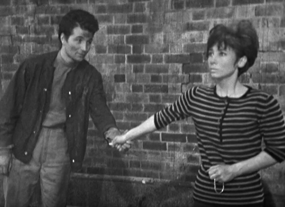 David takes a shellshocked Susan by the hand and prepares to lead her away