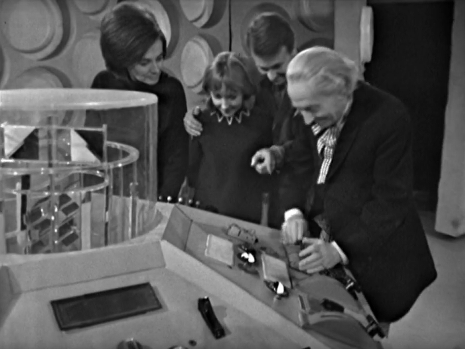 The console room of the TARDIS, once again crowded with a little family: The Doctor, Ian, Barbara and Viki