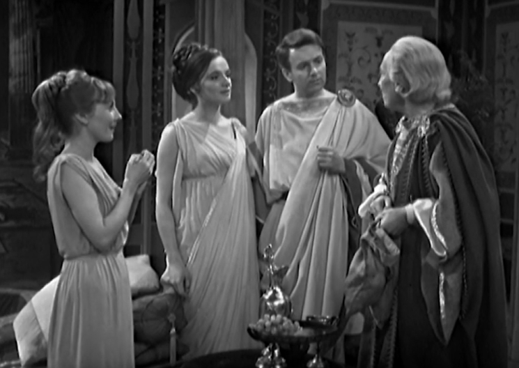 The TARDIS crew stand in togas in a Roman villa